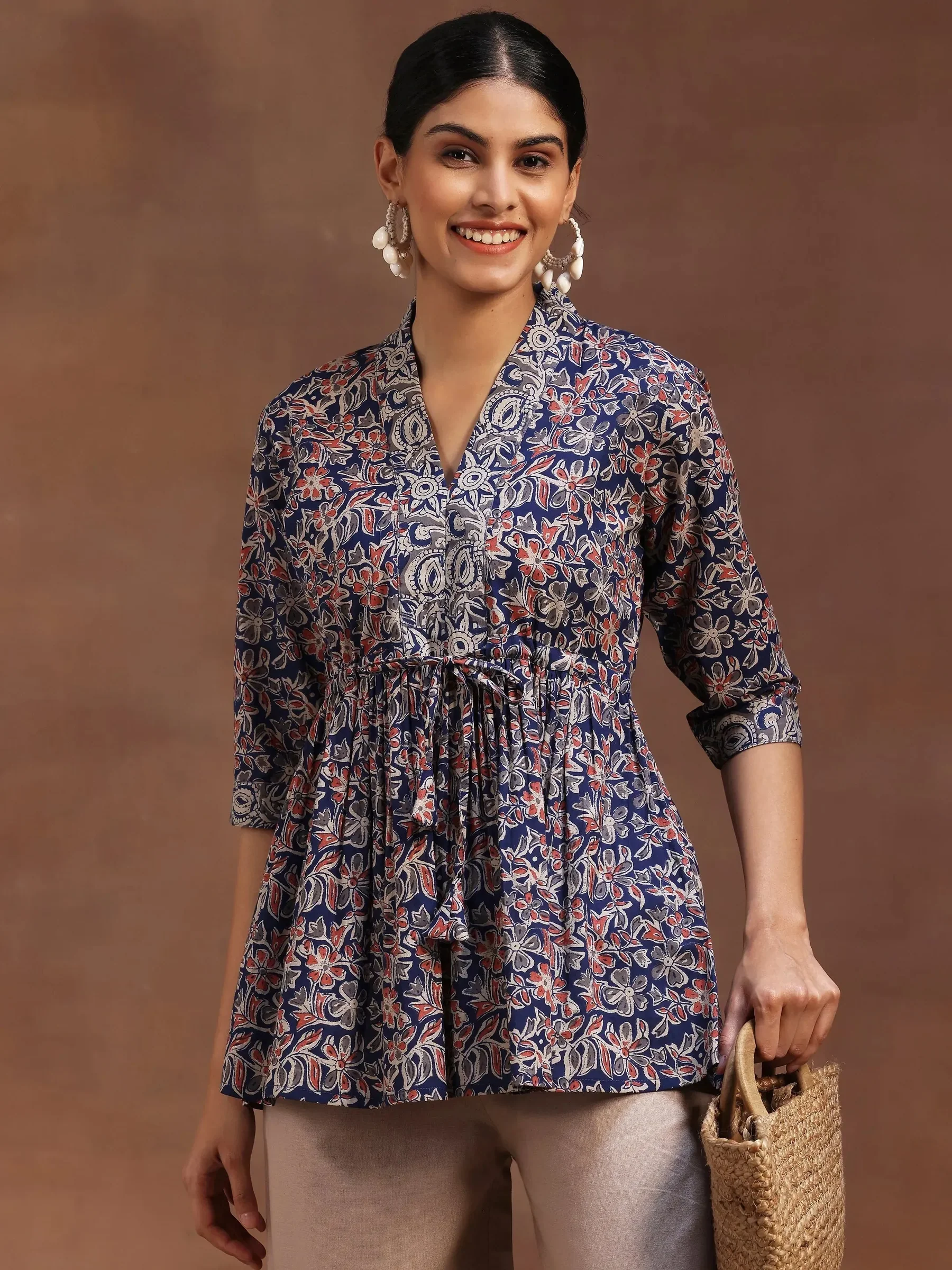 29102O_1_82b00054-a915-46a6-bb41-43a1eda438aa.webp Blue Printed Cotton A-Line Kurti - Image 1